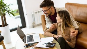 Millennial Couple looking at finances